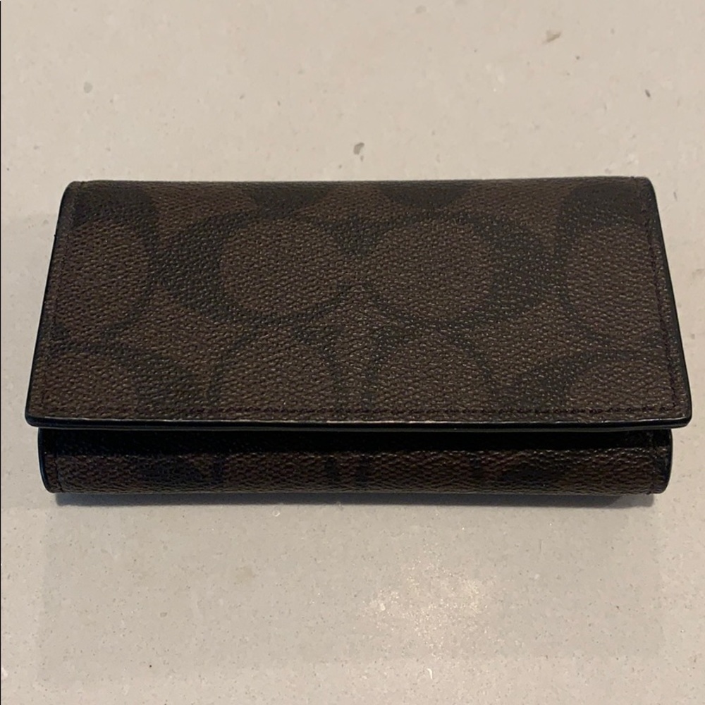 Coach four ring key case